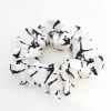 Lacrosse Unlimited White And Black Jumpgirl Scrunchie 1 Lacrosse Unlimited White And Black Jumpgirl Scrunchie -Lacrosse Unlimited Shop scrunchie white and black lax girl logo
